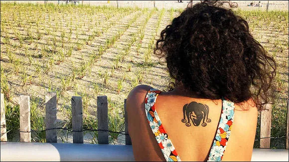 Meet Ad land's girl with the jester tattoo