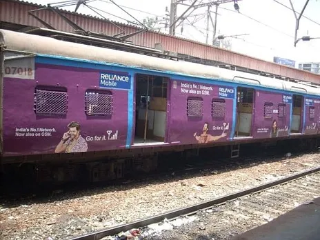 Reliance Mobile Exterior Branding  on local Trains of Mumbai