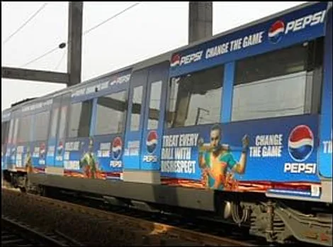 Mudra Max wraps Delhi Metro trains with Pepsi packaging