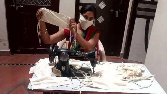 28 year old helps community fight COVID 19 by stitching mask at home