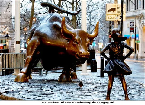 McCann NY helps client place a statue of a defiant girl in front of the iconic Wall Street bull
