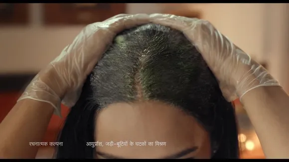 Vasmol advertises shampoo that colours hair…