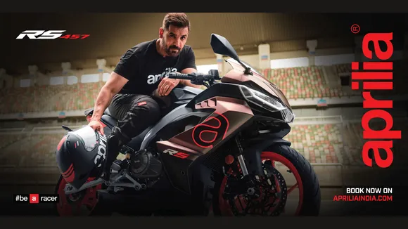 John Abraham invites all to turn, pull, and release the soul in Aprilia RS457 ad