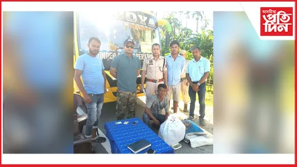 হেলেম আৰক্ষীৰ অভিযানঃ যাত্ৰীবাহী বাছৰ পৰা গাঞ্জাসহ এজনক গ্ৰেপ্তাৰ