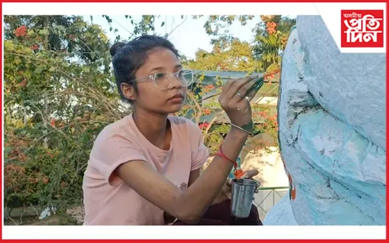 নিৰ্জীৱ শিলক ৰং তুলিকাৰে ন ৰূপত সজাই তোলাৰ চেষ্টা এগৰাকী যুৱতীৰ...