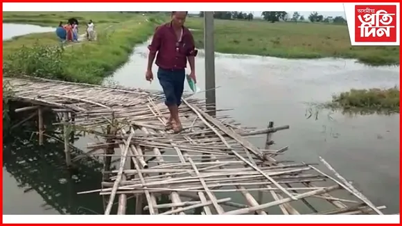 জৰাজীৰ্ণ বাঁহৰ দলং পাৰহৈ যাব লাগে লেছাম আৰু চেঙামাৰী গাঁৱলৈ : পথ আৰু দলং নিৰ্মাণৰ দাবী AJYCPৰ