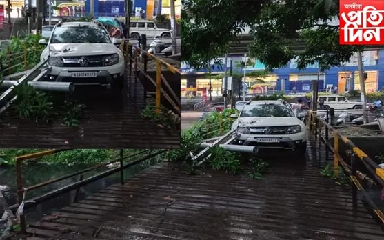 মহানগৰীত ভয়ংকৰ কাণ্ডঃ গাড়ীৰ ওপৰত বাগৰি পৰিল ইলেক্ট্ৰিক খুঁটা