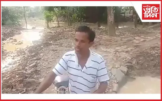 কপিলীৰ বানত বিধ্বস্ত কচুৱাৰ এটা ৰাজপথ...