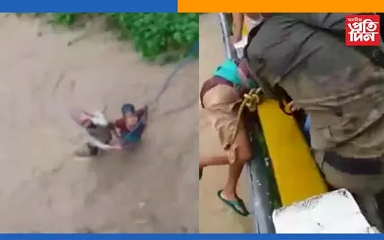 অৰুণাচলত চিয়াং নদীৰ ভয়ংকৰ ৰূপ! বাঢ়নি পানীত আৱদ্ধ দুজন ৰছী বান্ধি উদ্ধাৰ… VIDEO