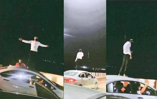 Viral Video: भोपाल में एक लड़के ने चलती कार के ऊपर चढ़कर पी सिगरेट, वीडियो हुआ वायरल