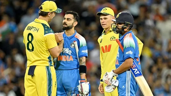 68fcbf6d49473-indias-virat-kohli-2l-shakes-hands-with-australia-captain-mitchell-marsh-l-as-rohit-sharma-r-251535767-16x9