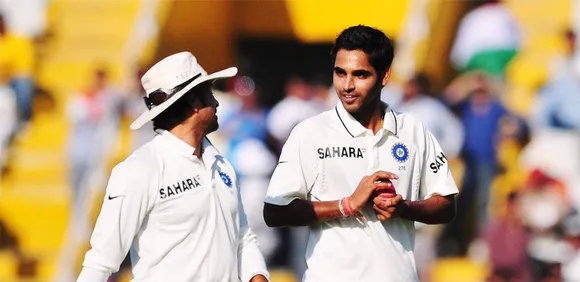 Bhuvneshwar Kumar and Sachin Tendulkar