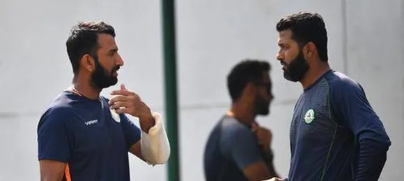Wasim Jaffer with Cheteshwar Pujara