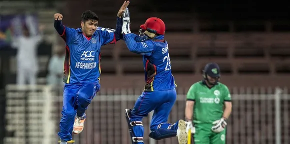Cricketers rejoicing a T20 win