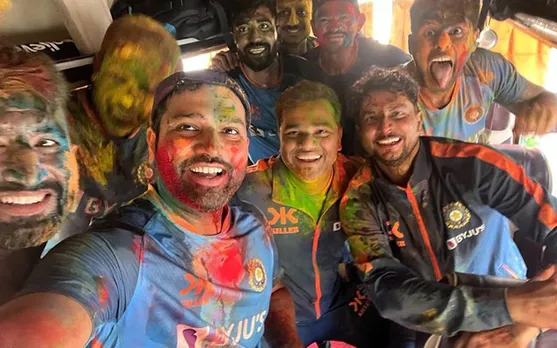 Team India playing Holi
