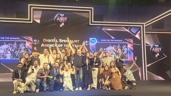 Team Enormous poses for a photo session after receiving digital specialist of the year title at the Abby Awards 2025.