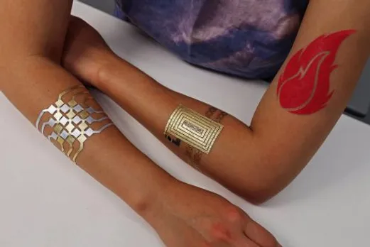 CIOL Check out this gold and silver tattoo that can control your smart phone