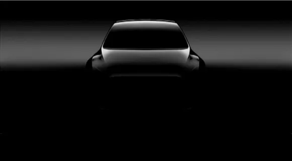 CIOL In a shareholder meeting, Tesla CEO Elon Musk talks about Model Y, drops first teaser
