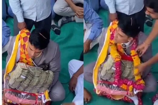 Groom being offered a wad of cash