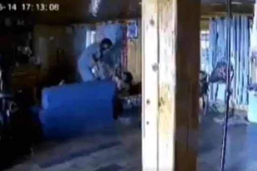 Father beating adopted daughter