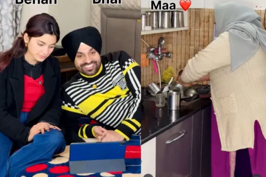 Brother and sister seeing mother working in the kitchen