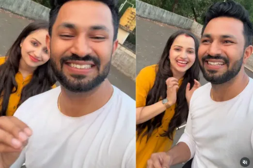 Husband paying money to wife for saving