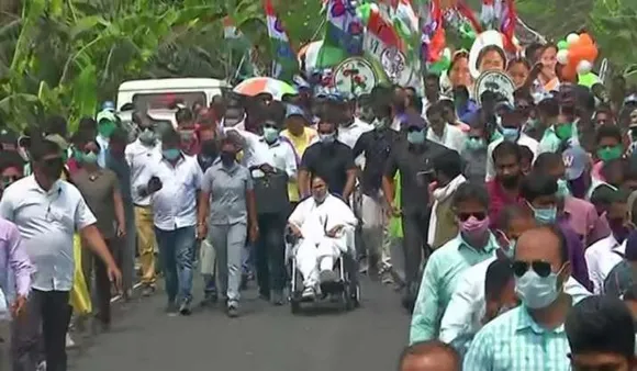 Mamata Banerjee TMC Mamata standing from Wheelchair BJP Amit Shah Nandigram