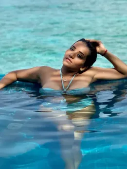 Monalisa turns mermaid in blue bikini