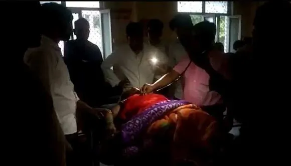 Doctor examines with torch