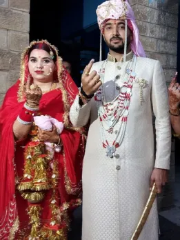 Country First! Newly Wed Couples Vote in Wedding Dress