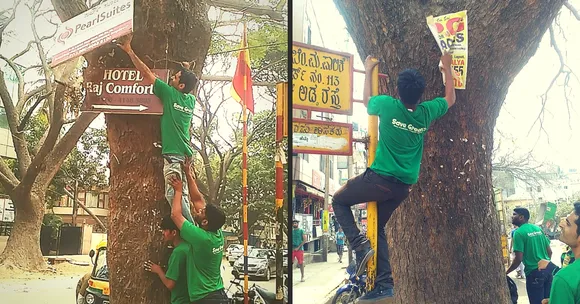 A Group in Bengaluru Protects Trees by Removing Nails & Posters from Them Every Sunday