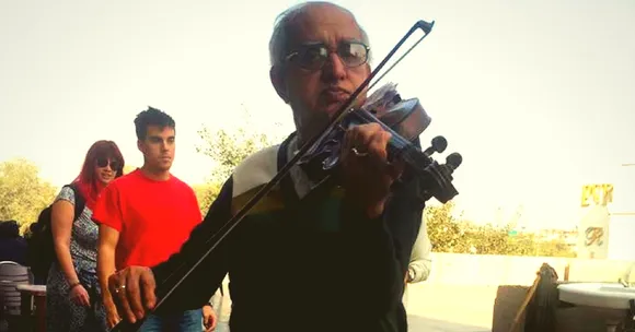 72-Year-Old Artist Playing Violin for His Cancer-Stricken Wife Tugs the Nation's Heartstrings