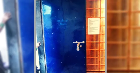 Blue Door behind Building 21-B, Lallubhai Compound Mankhurd
