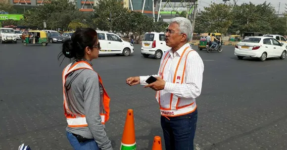 Here's Why This 57-YO Businessman Directs Traffic in Gurugram's Choked Streets