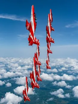 Aero India In Pics: IAF’s Surya Kiran Aerobatics; Shining Bright Since 1998
