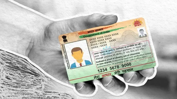 Aadhaar photocopy UIDAI ban QR code digital verification on mobile screen