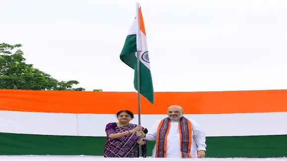 Amit Shah hoists the National Flag at his residence as part of the 'Har Ghar Tiranga' movement