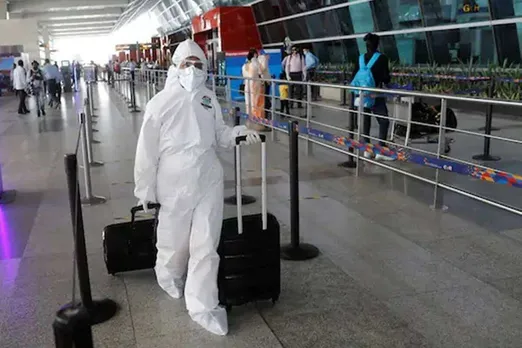 joe biden administration restricts travel to us from india and but exempted students academics journalists from india