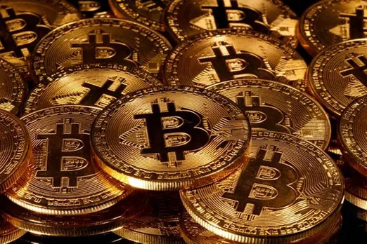 Bitcoin slumps 6 pc as new COVID-19 strain upsets wider markets