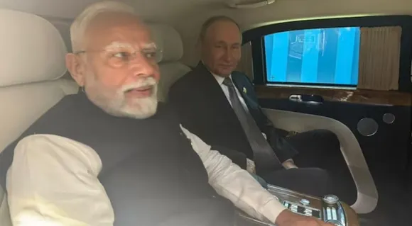modi and putin in a car