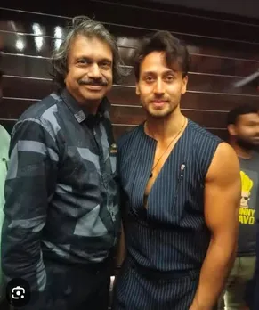 Tiger Shroff ( right)  with sr journalist Chaitanya Padukone