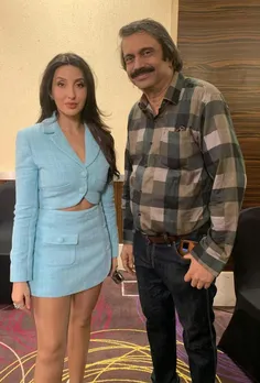 Star-actress-dancer Nora Fatehi with sr journalist Chaitanya Padukone