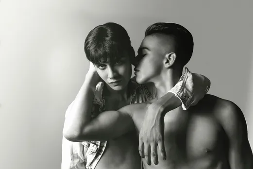 Two men pose intimately to depict queer masculinity in India, as week as redefining masculinity