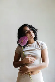 A woman worried about her gut health and digestive issues