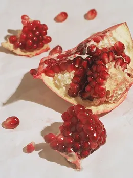 A picture of an open pomegranate, a memory boosting food