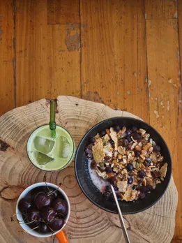 A spread featuring matcha, oatmeal, cereal, milk and other superfoods for brain