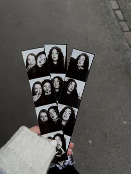 A friend thinking of her broken friendship by seeing pictures of herself with her best friend