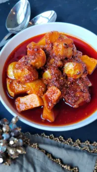 A picture of a bowl of pickled kohlrabi pickle to show the diversity in Indian condiments and achaars and chutneys that add to Indian meals