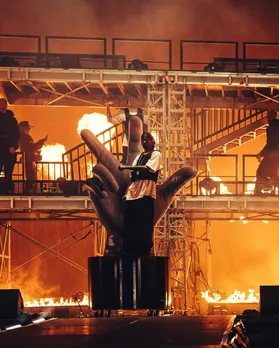 @A picture of a stage with rappers performing to show how there now a Hip=Hop music festival in India dedicated to the genre that