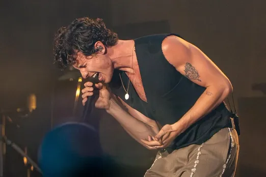 A picture of Shawn Mendes performing at the Lollapalooza music festival in India at Mahalaxmi Racecourse